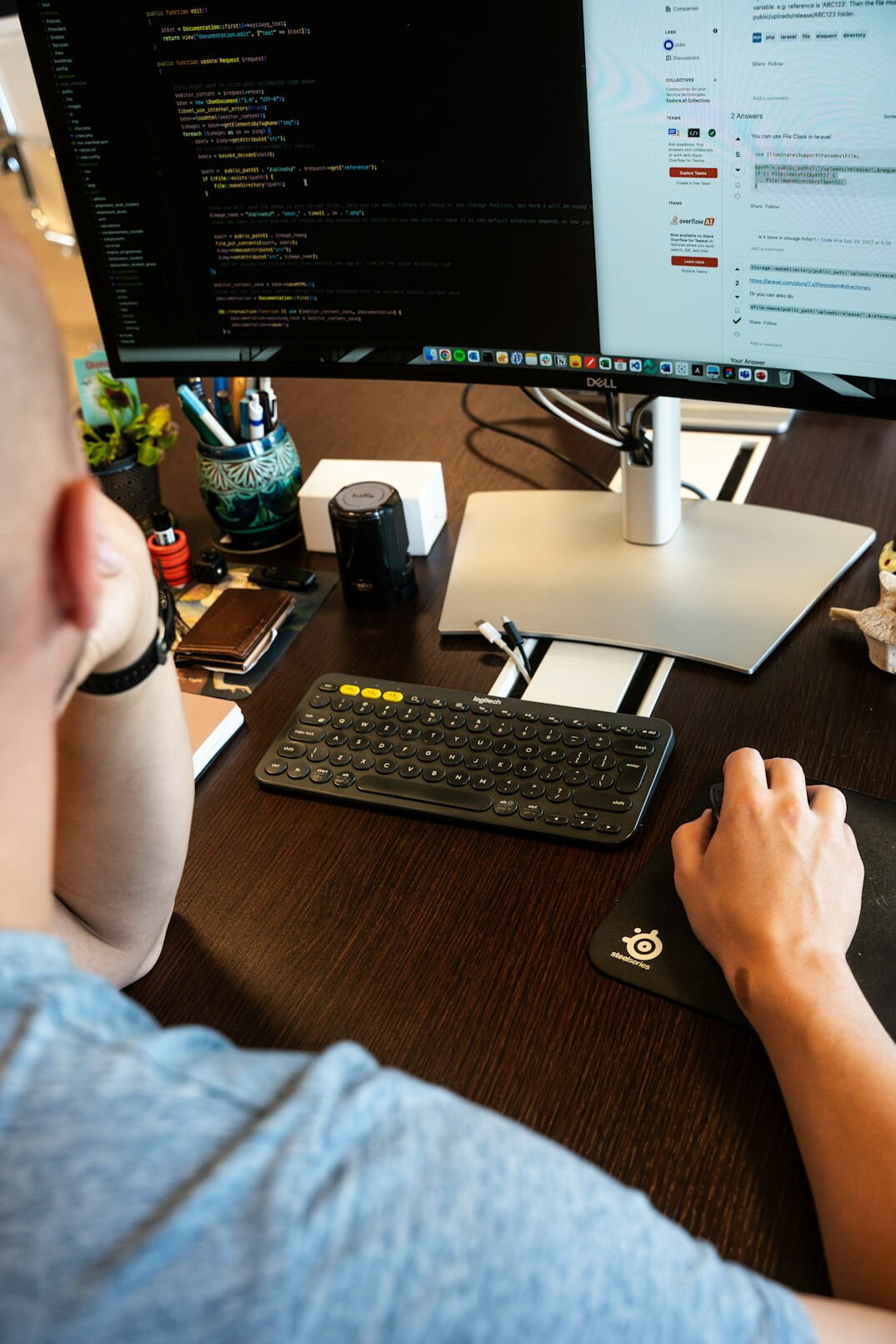 person coding at desk