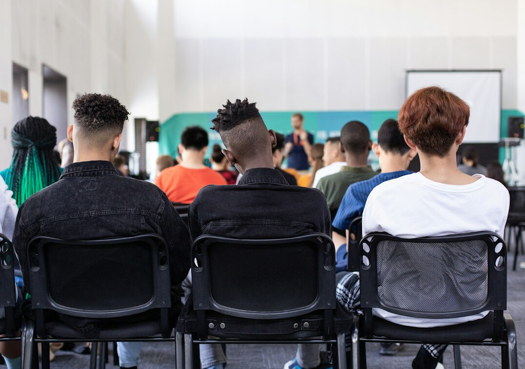 students learning programming in classroom